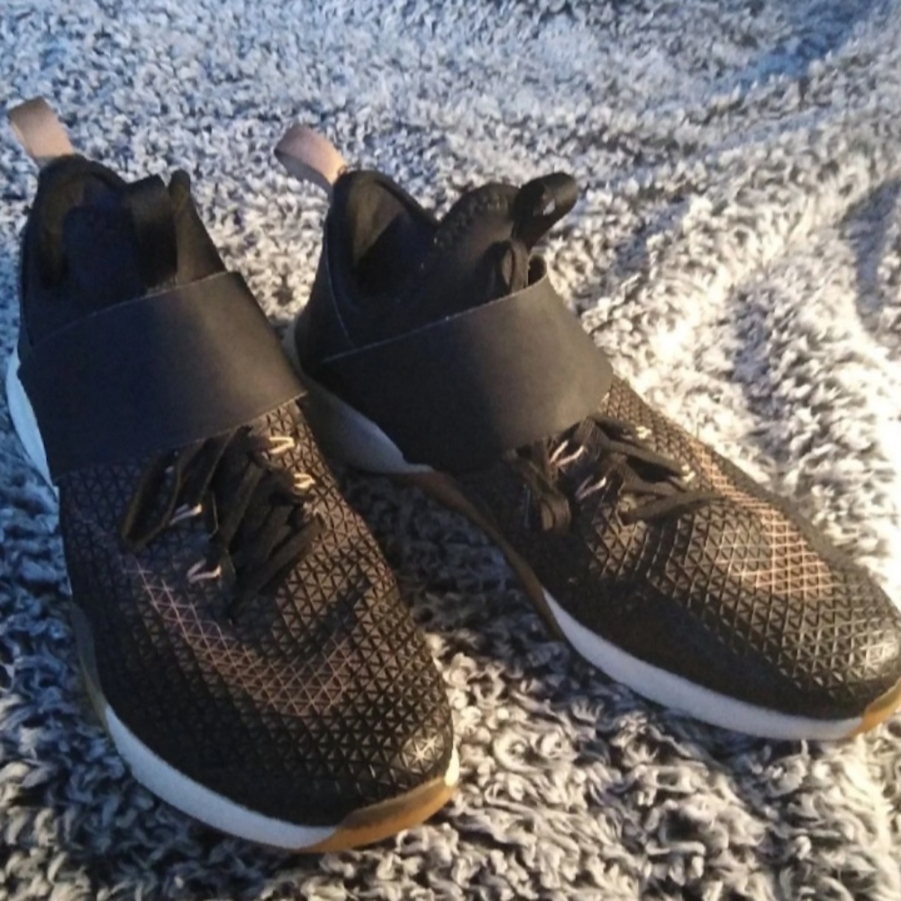 Nike women's running shoes with a Velcro strap